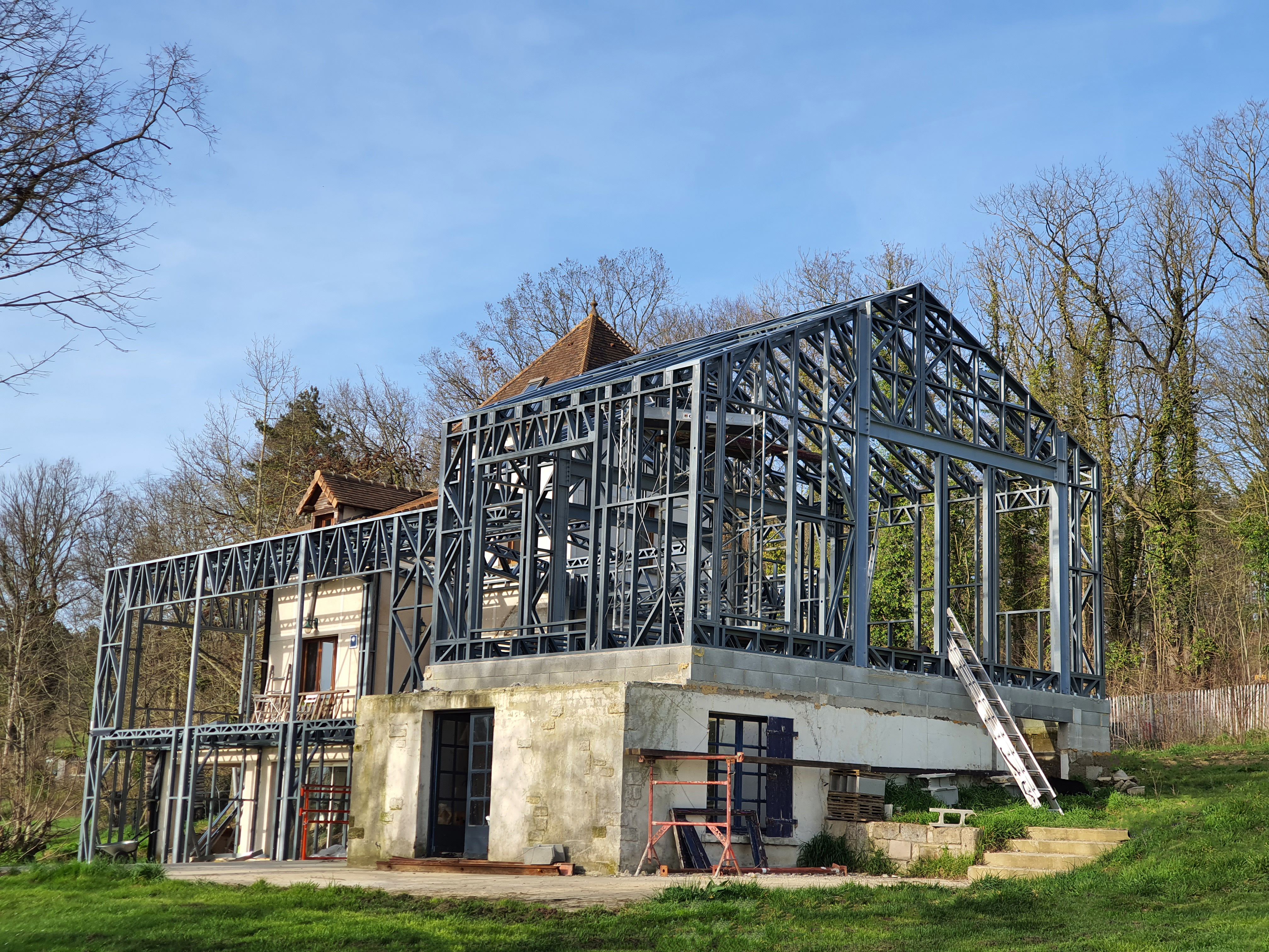 Réhabilitation d'une maison avec extension et surélévation